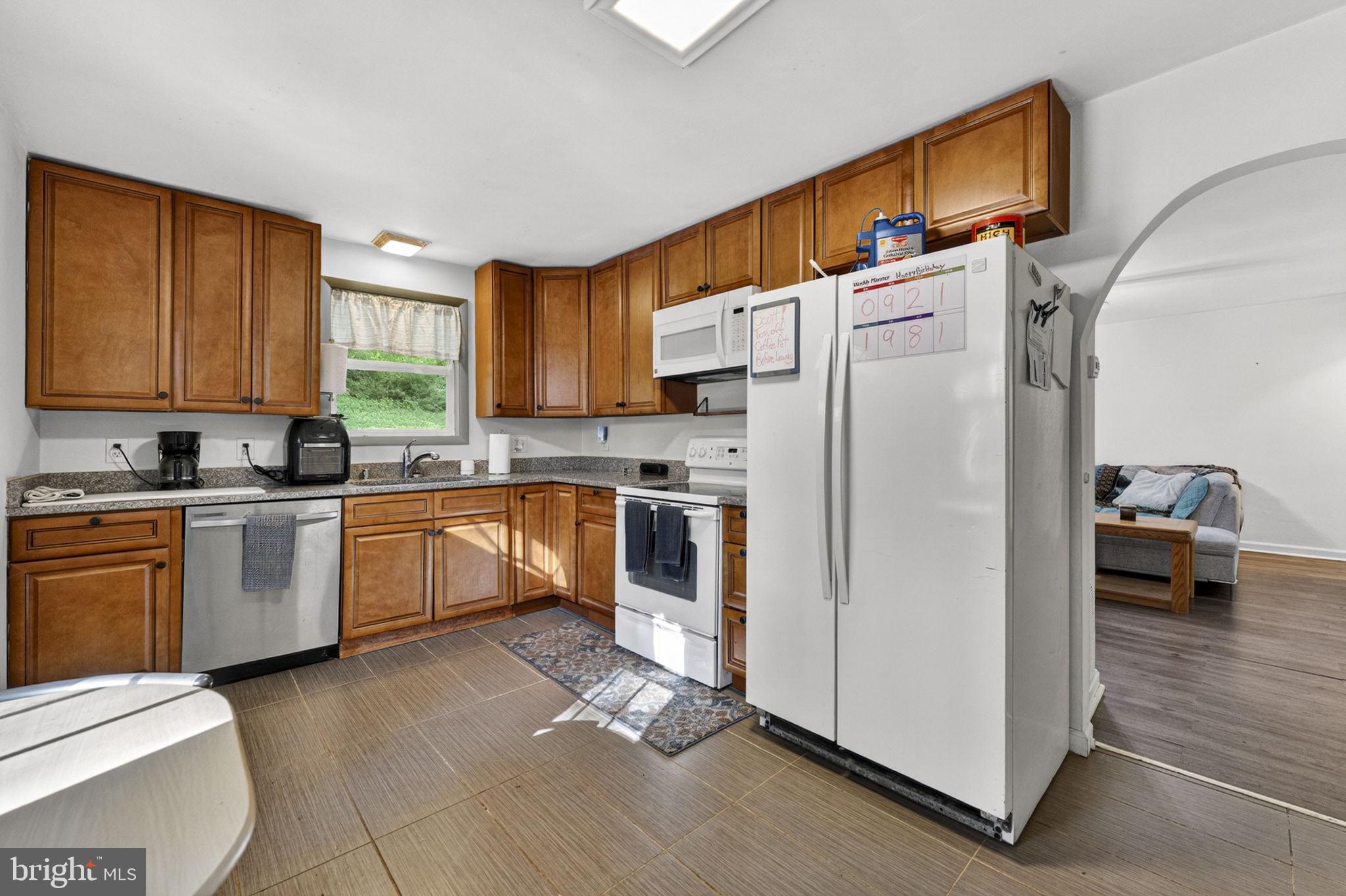 673 Creek Road Front Royal, VA 22630 - Photo 26 of 64 Modern kitchen with warm wood tones.