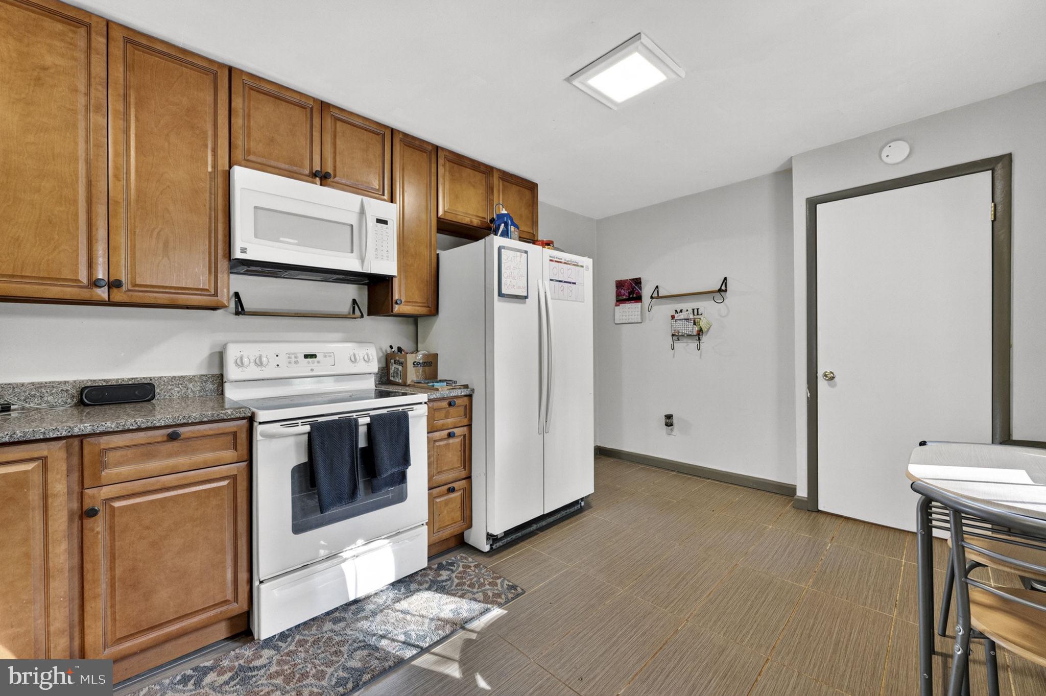 673 Creek Road Front Royal, VA 22630 - Photo 28 of 64 Modern kitchen with warm wood tones.