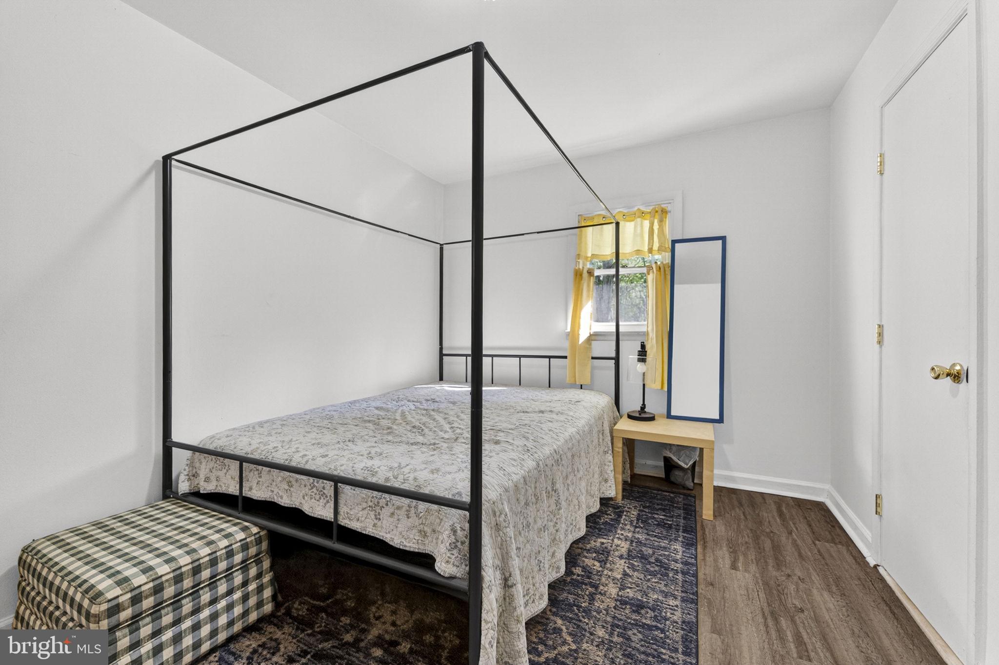 673 Creek Road Front Royal, VA 22630 - Photo 31 of 64 Charming bedroom with modern elegance.