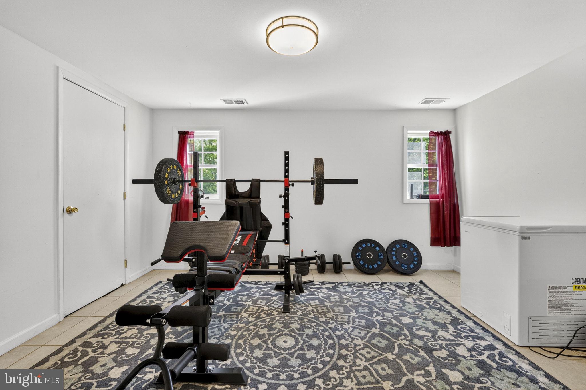 673 Creek Road Front Royal, VA 22630 - Photo 50 of 64 Home gym with natural light.