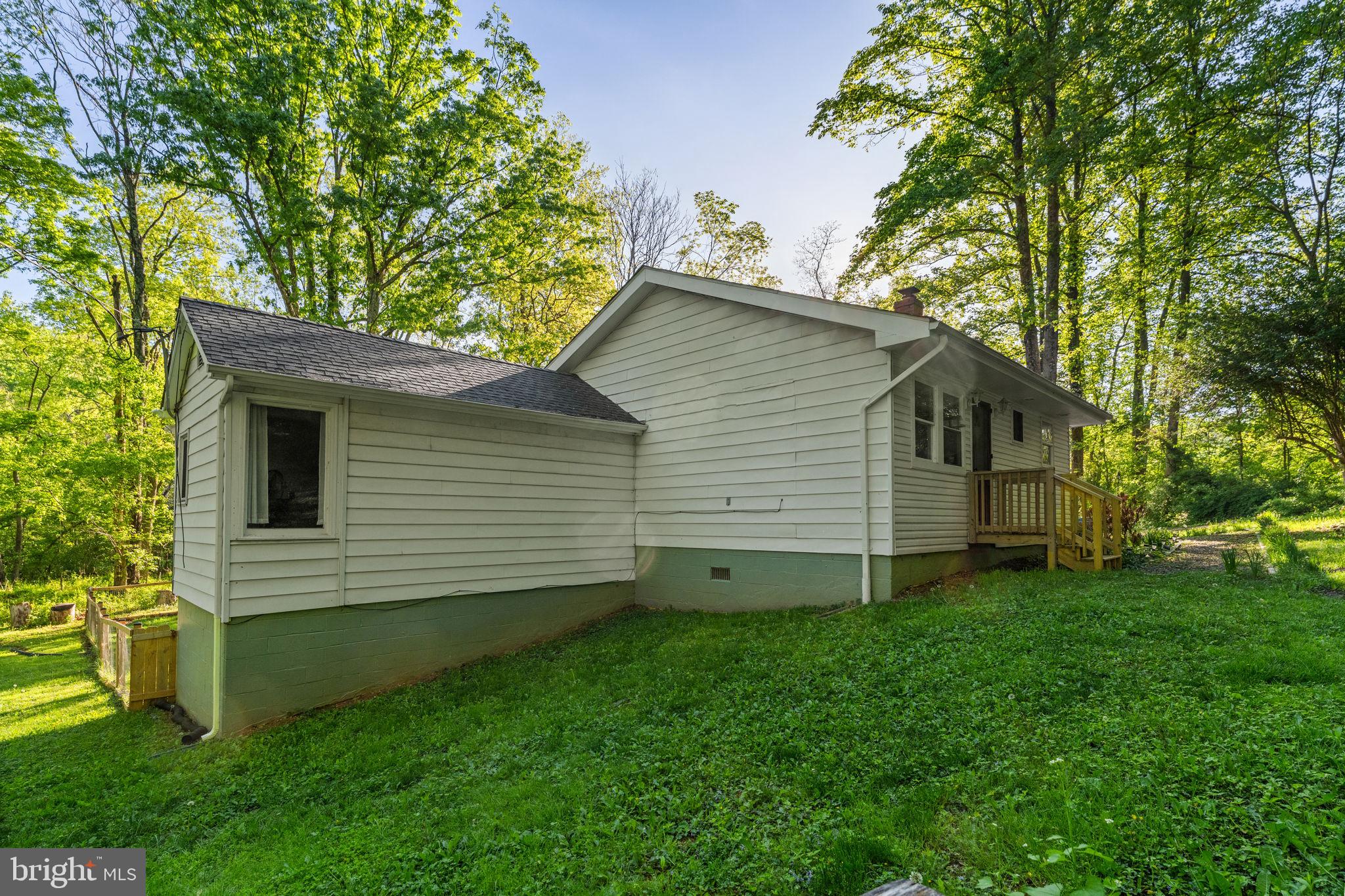 673 Creek Road Front Royal, VA 22630 - Photo 58 of 64 Charming home nestled in lush greenery.
