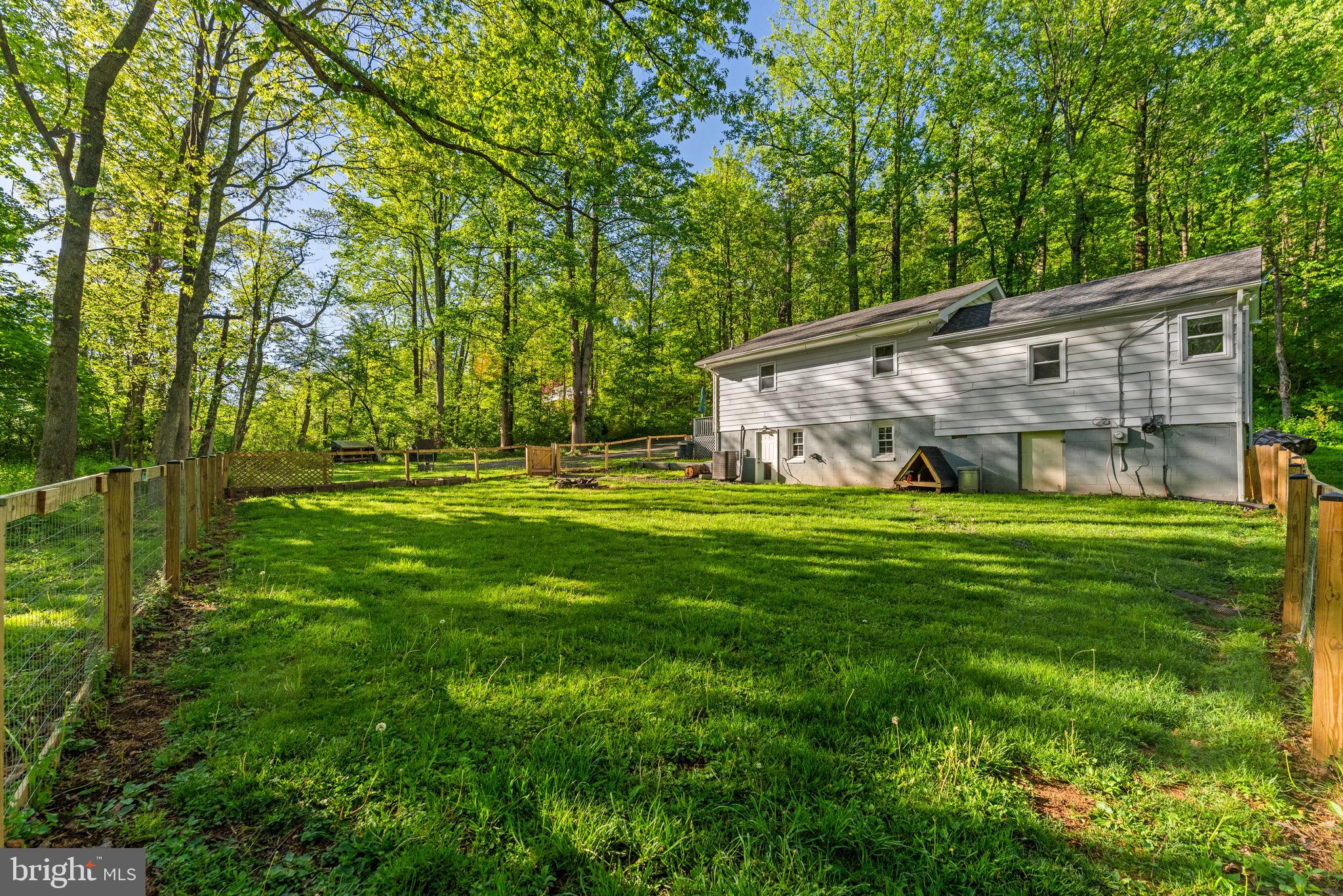673 Creek Road Front Royal, VA 22630 - Photo 61 of 64 Serene home nestled in lush greenery.