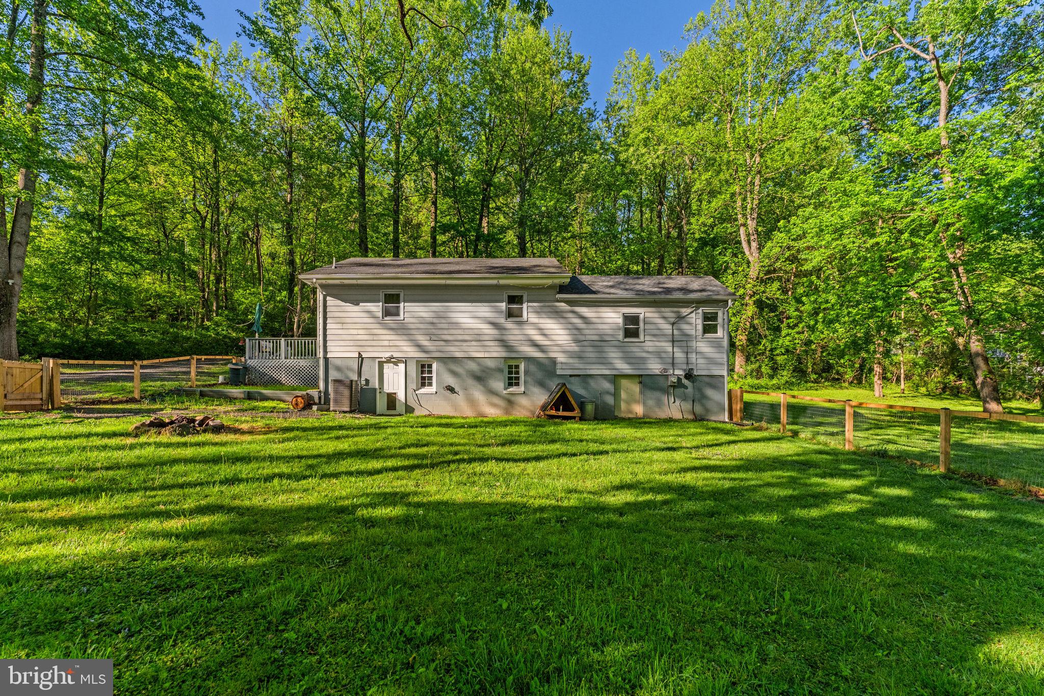 673 Creek Road Front Royal, VA 22630 - Photo 62 of 64 Serene home nestled in lush greenery.