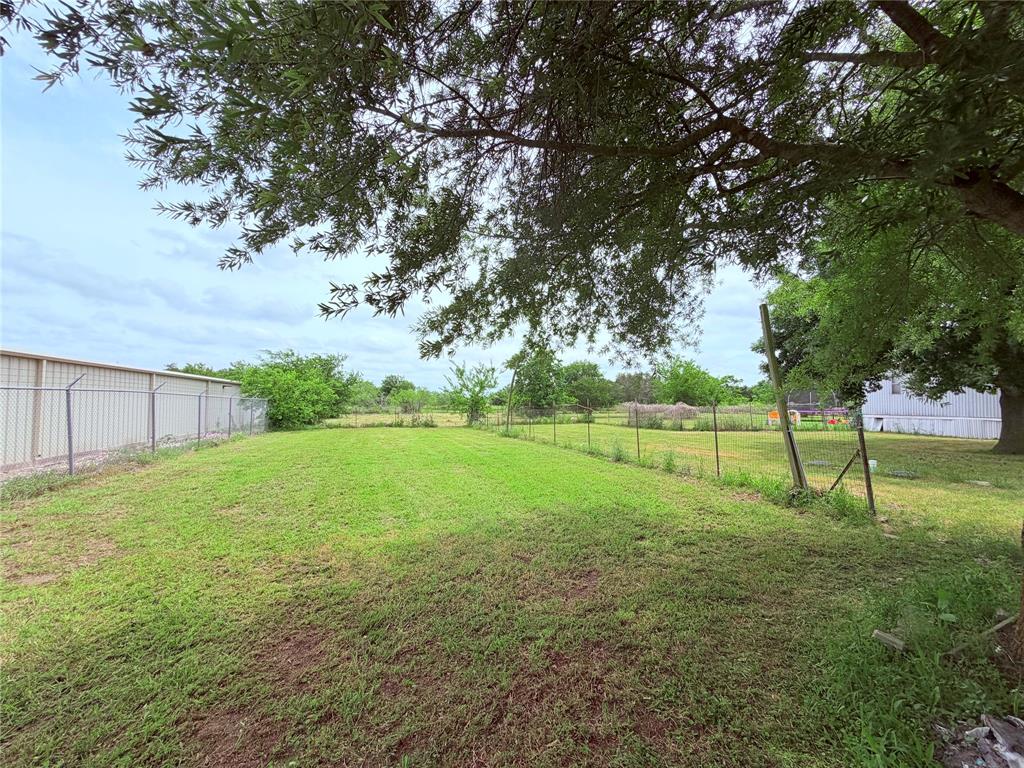 3789 Jacobs Lane Kaufman, TX 75142 - Photo 31 of 33 a view of a field with a tree