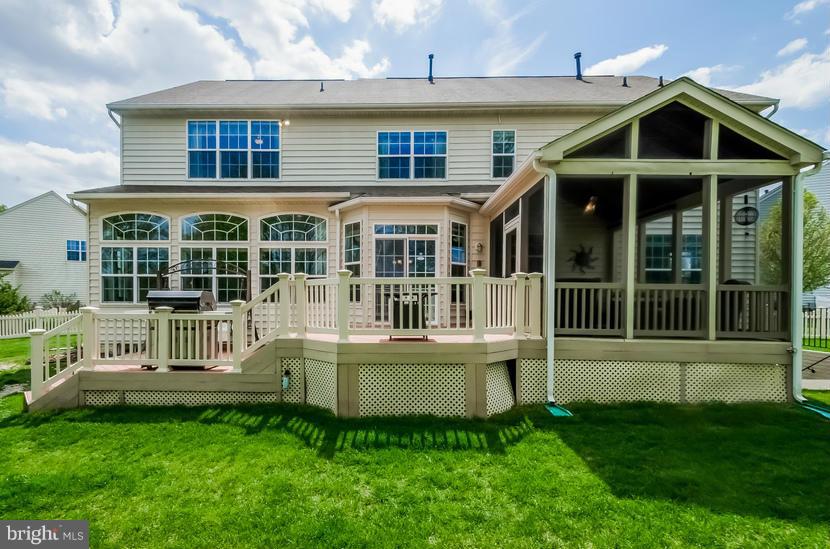 615 Sand Road Severn, MD 21144 - Photo 2 of 30 a front view of a house with a yard