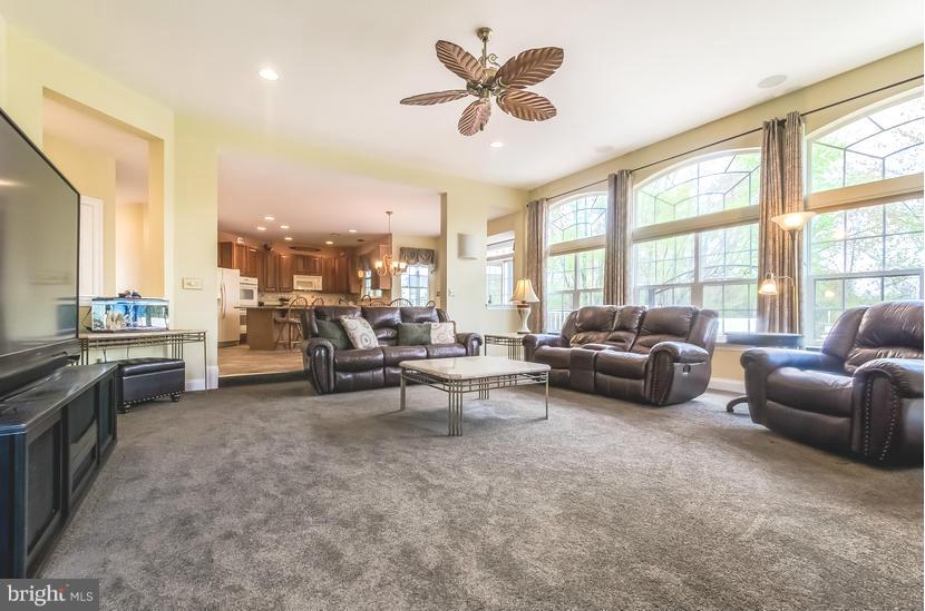 615 Sand Road Severn, MD 21144 - Photo 11 of 30 a living room with furniture and a large window