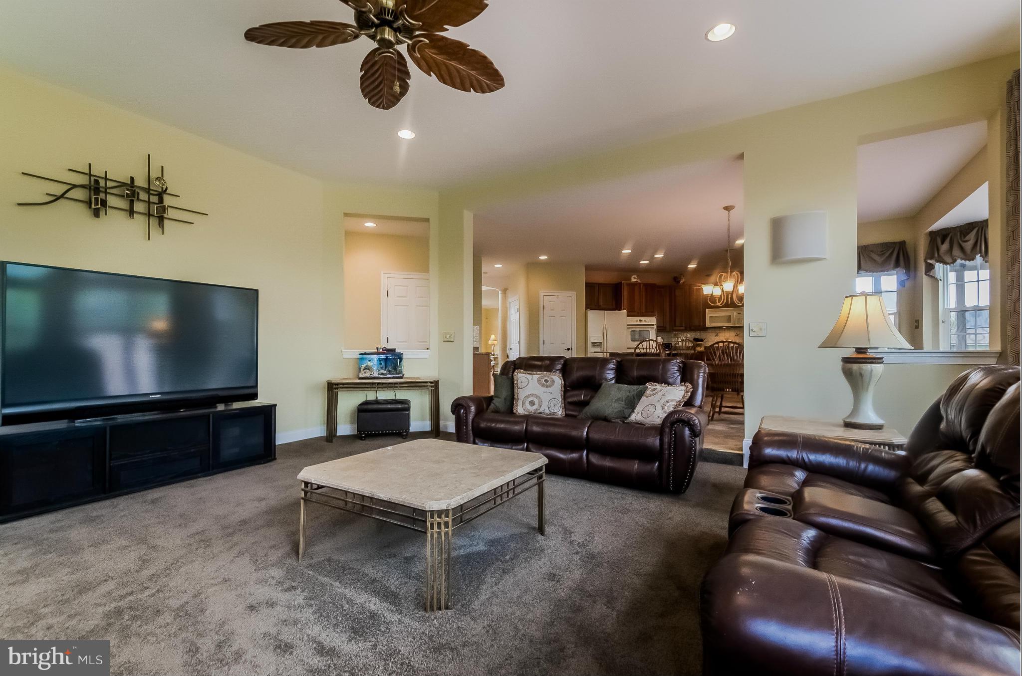 615 Sand Road Severn, MD 21144 - Photo 15 of 30 a living room with furniture and a flat screen tv
