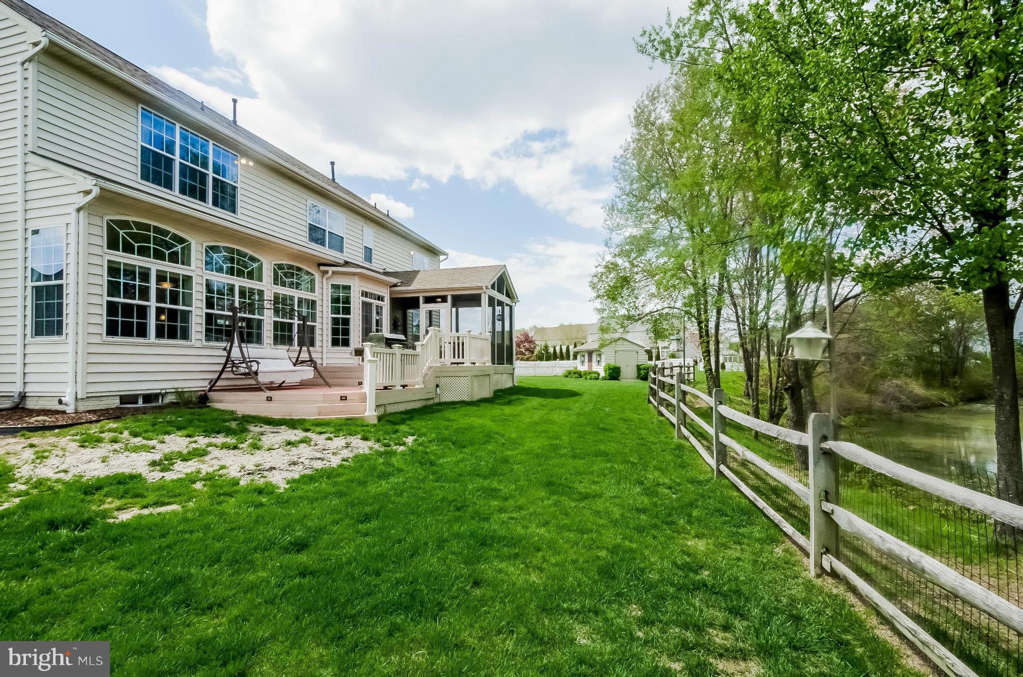 615 Sand Road Severn, MD 21144 - Photo 27 of 30 a view of a house with backyard and porch