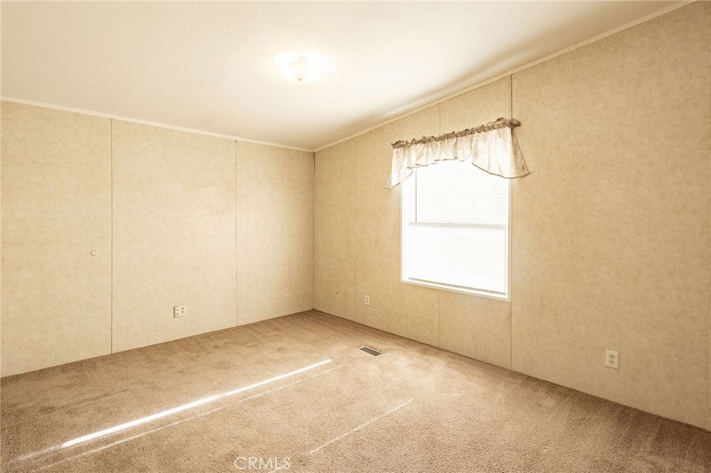 36249 Campbell Road Lucerne Valley, CA 92356 - Photo 19 of 32 a view of an empty room with a window