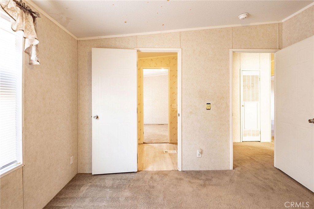 36249 Campbell Road Lucerne Valley, CA 92356 - Photo 21 of 32 an empty room with windows