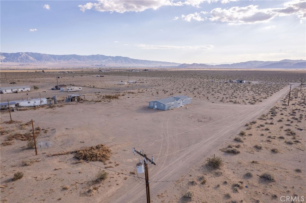 36249 Campbell Road Lucerne Valley, CA 92356 - Photo 28 of 32 a view of an ocean beach and mountain