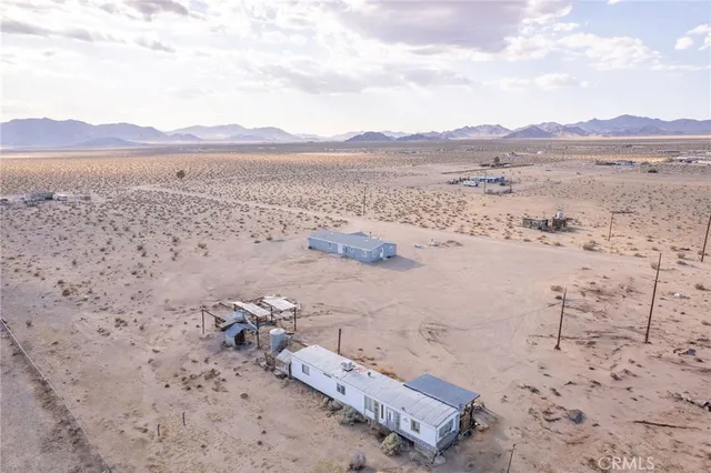 a view of ocean and mountain
