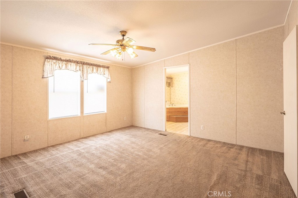 36249 Campbell Road Lucerne Valley, CA 92356 - Photo 7 of 32 a view of an empty room with a window
