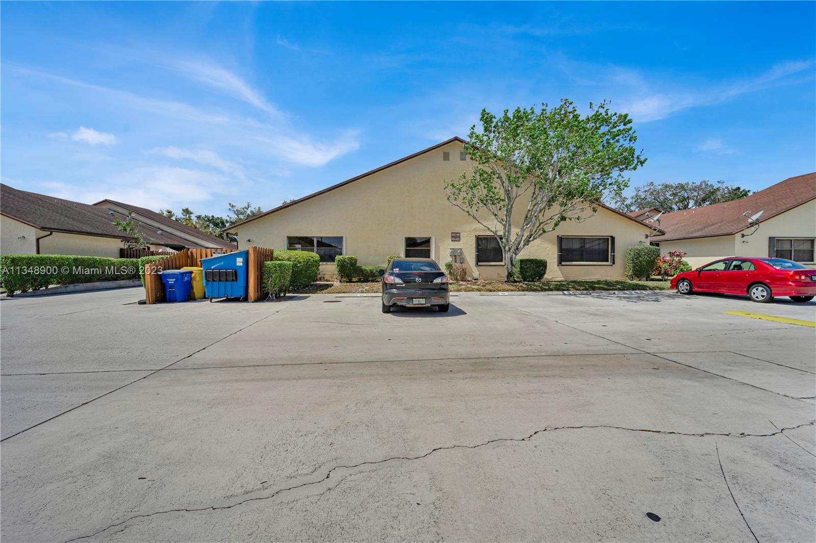 464 Springdale Circle, Unit 46D Palm Springs, FL 33461 - Photo 21 of 21 a view of street with parked cars