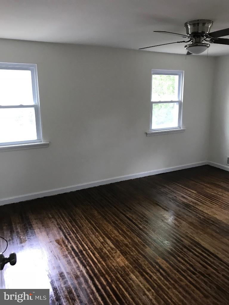 408 Villanova Road Glassboro, NJ 08028 - Photo 12 of 18 wooden floor in an empty room