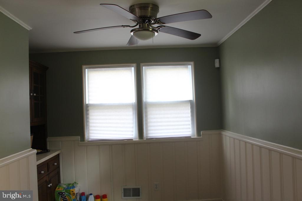 408 Villanova Road Glassboro, NJ 08028 - Photo 6 of 18 a view of an empty room with a window