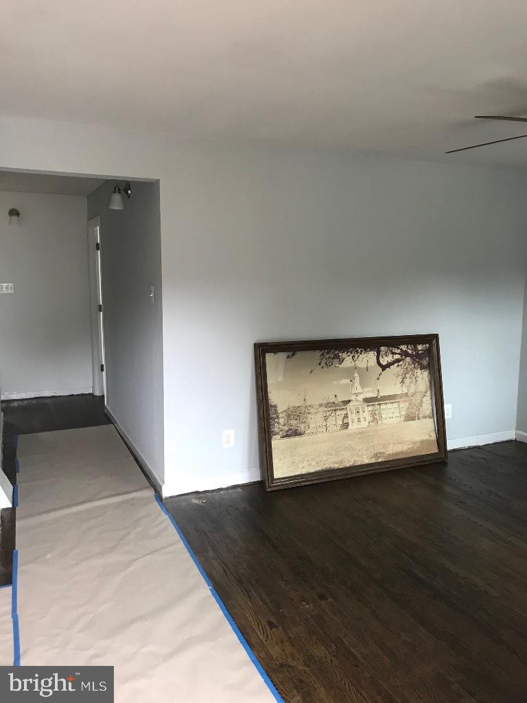 408 Villanova Road Glassboro, NJ 08028 - Photo 7 of 18 a view of an empty room with wooden floor and a window