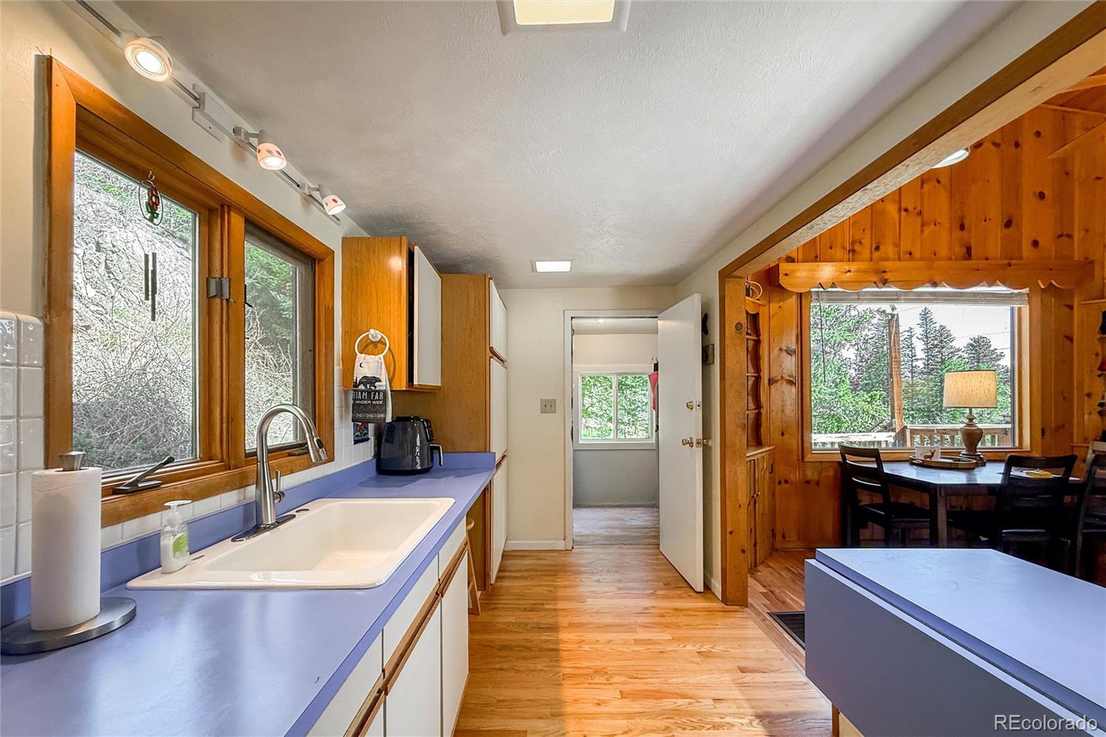 3148 Riverside Drive Lyons, CO 80540 - Photo 21 of 41 a large living room with large windows