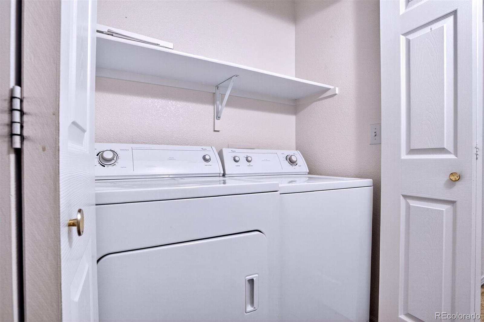 5320 Allison Street, Unit 106 Arvada, CO 80002 - Photo 13 of 15 a utility room with dryer and washer