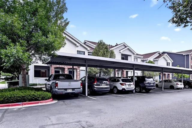 a view of a car parked in front of a house