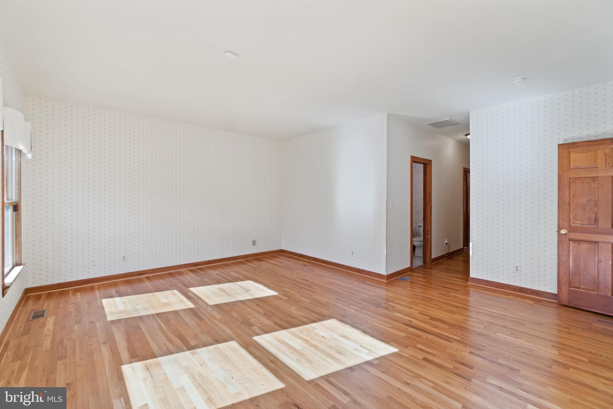 7815 Shannon Hill Road Louisa, VA 23093 - Photo 19 of 63 main floor primary bedroom