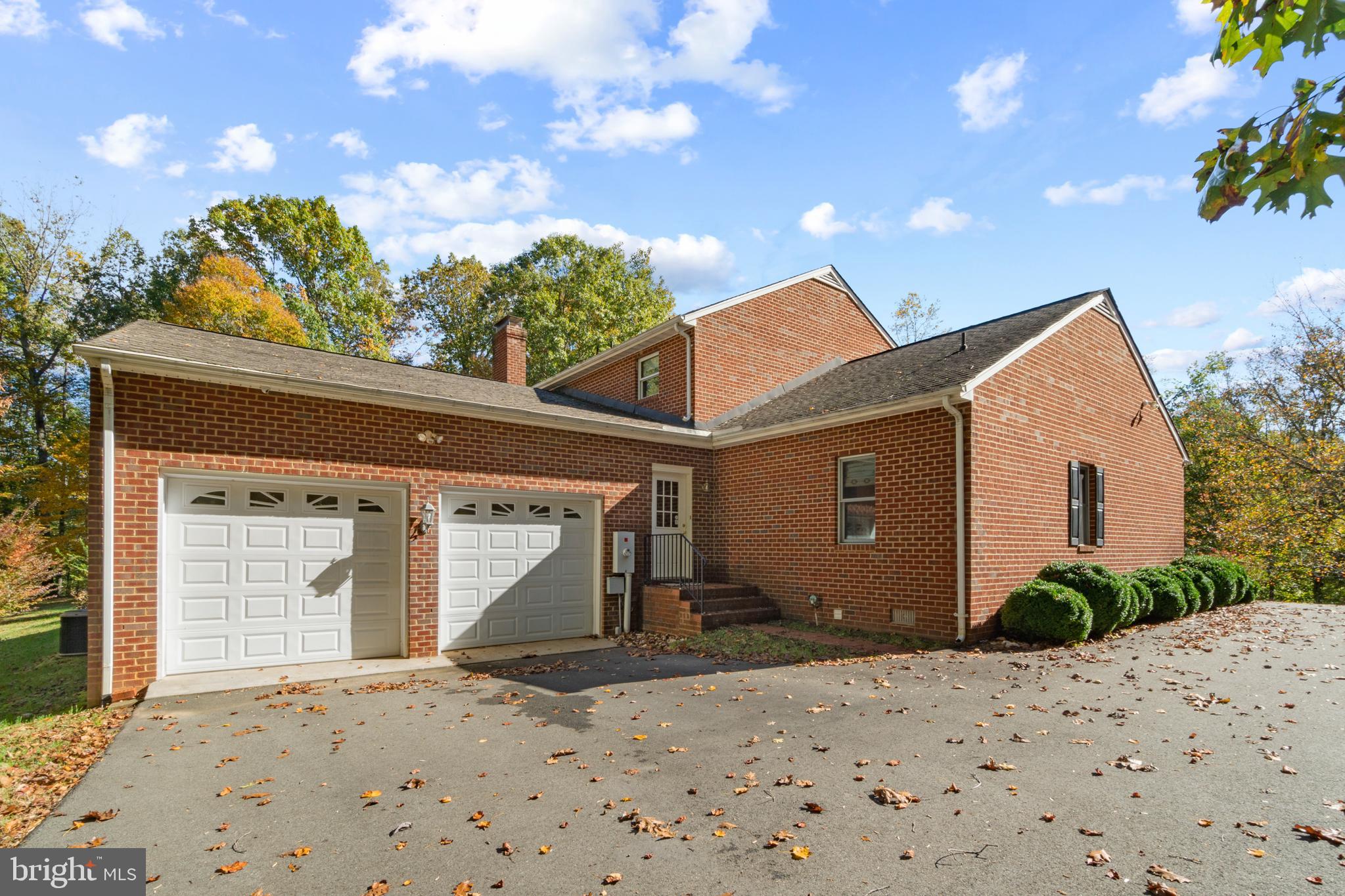 7815 Shannon Hill Road Louisa, VA 23093 - Photo 42 of 63 Two car garage with loading dock inside