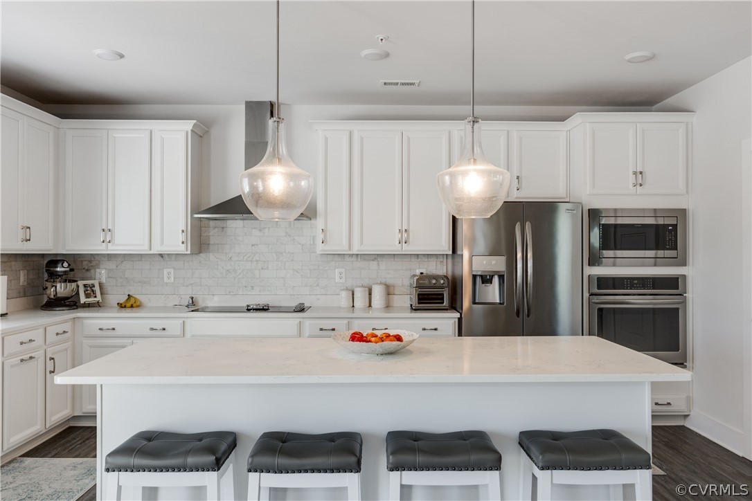 4332 Saunders Station Loop, Unit B Henrico, VA 23233 - Photo 17 of 42 a kitchen with cabinets and chairs
