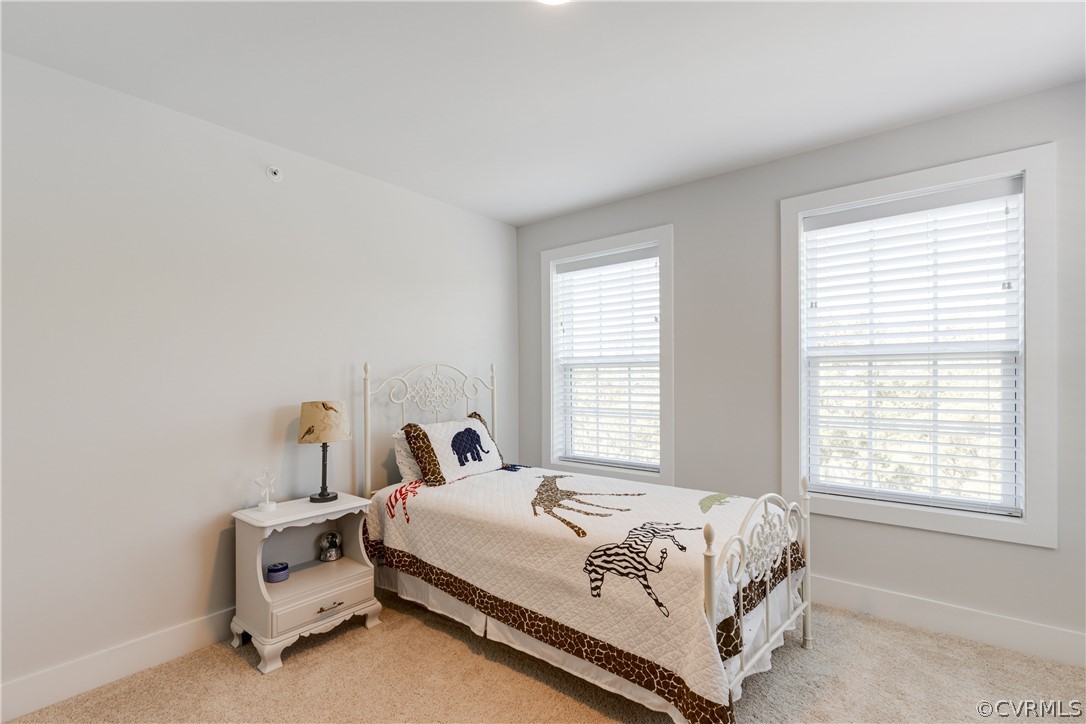 4332 Saunders Station Loop, Unit B Henrico, VA 23233 - Photo 35 of 42 a bedroom with a bed and a window