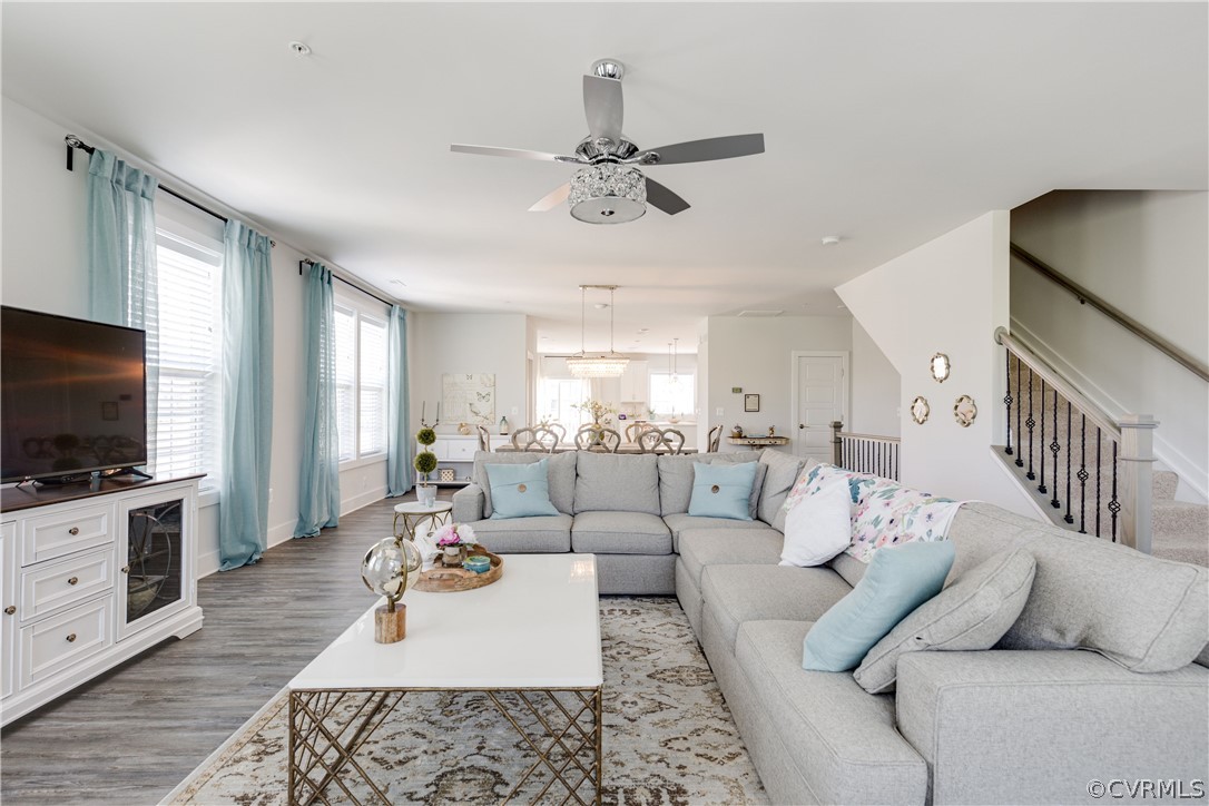 4332 Saunders Station Loop, Unit B Henrico, VA 23233 - Photo 6 of 42 a living room with furniture and a flat screen tv