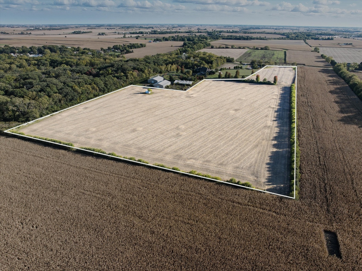 0 West Arsenal Road Manhattan, IL 60442 - Photo 2 of 18 a view of a dry yard with wooden fence