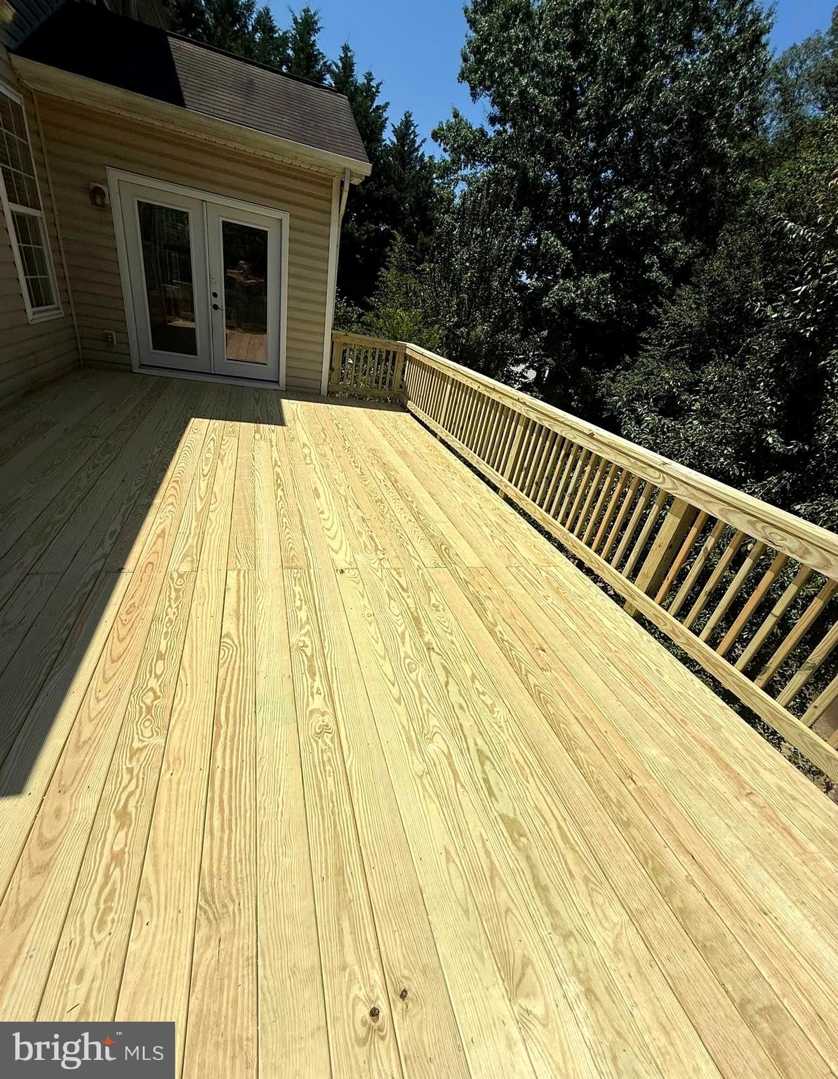 8832 Mullen Road King George, VA 22485 - Photo 35 of 39 full deck looking at door to sunroom