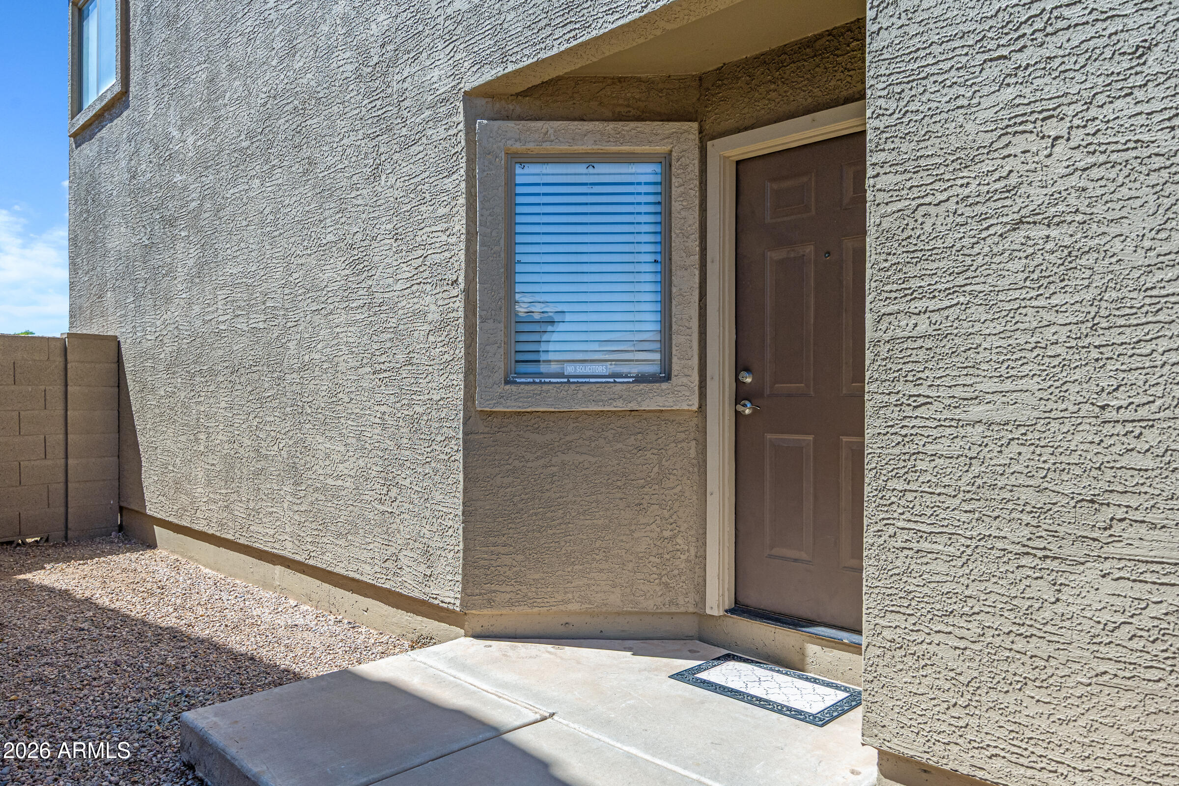 19408 North Braden Road Maricopa, AZ 85138 - Photo 4 of 51 a front view of a house with a yard