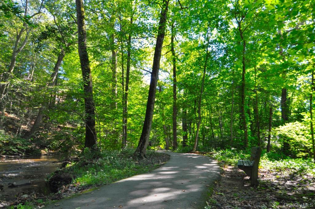 235 Garth Road, Unit D5E Scarsdale, NY 10583 - Photo 46 of 49 Bronx River Bike, Jogging and Walking Trail: – The Bronx River trail is a11.2 mile paved pathway from Palmer Road in the village of Bronxville to the Kensico Dam Plaza in Valhalla. The path travels crossovers the Bronx River many times traveling thru the Garth Woods reserve and runs parallel with the Bronx River Parkway Garth Road residents can access the trail at either end of Garth Road.