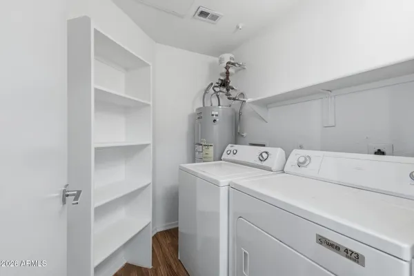 a utility room with dryer and washer