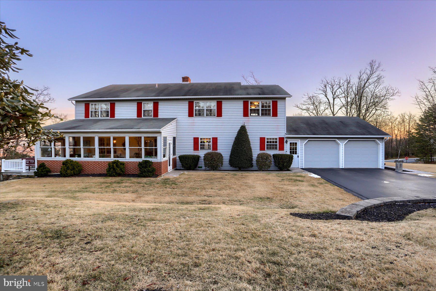 1065 Kuhn Road Boiling Springs, PA 17007 - Photo 40 of 49 a front view of a house with a yard