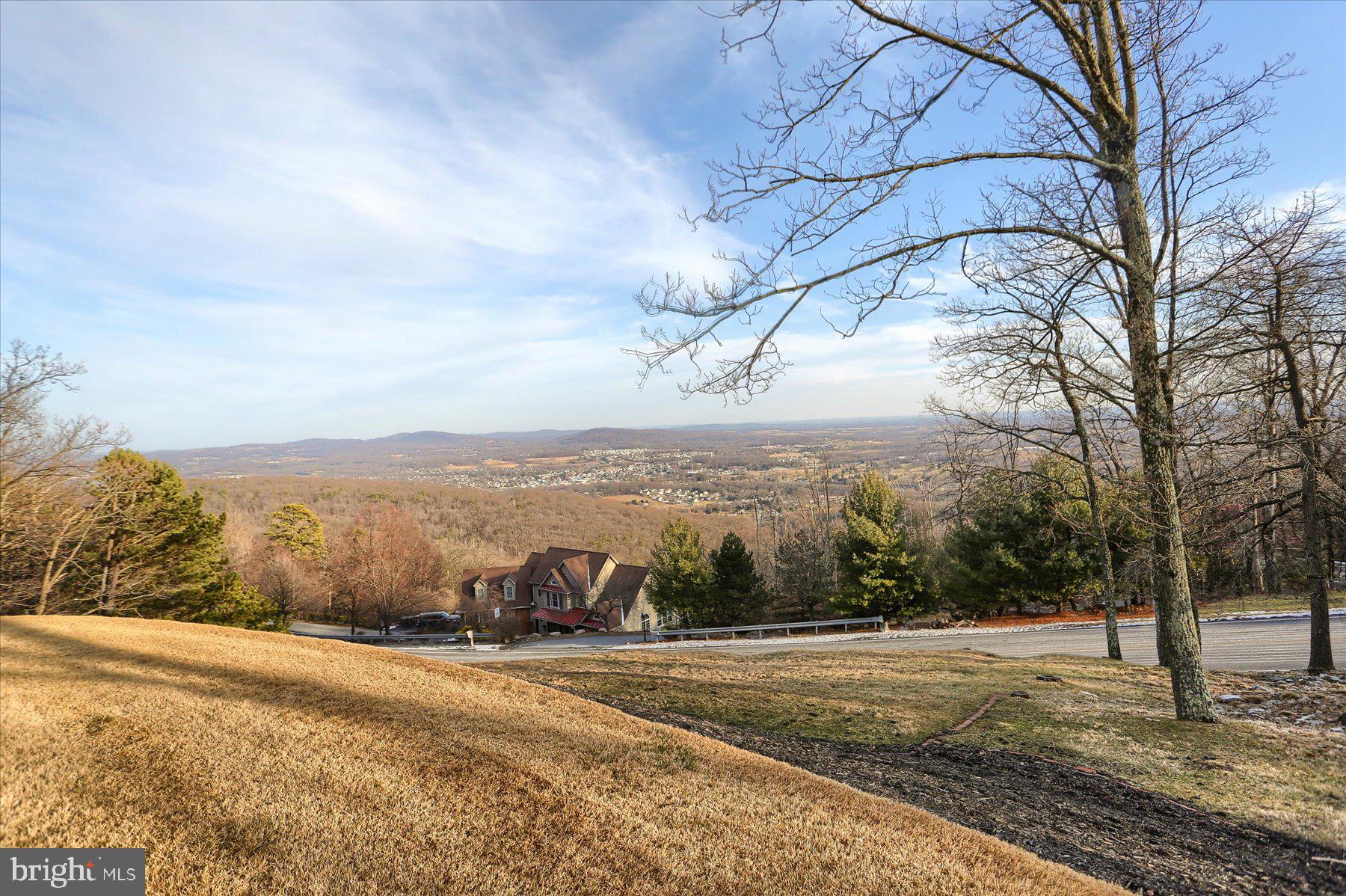 1065 Kuhn Road Boiling Springs, PA 17007 - Photo 6 of 49 a view of a yard with wooden fence