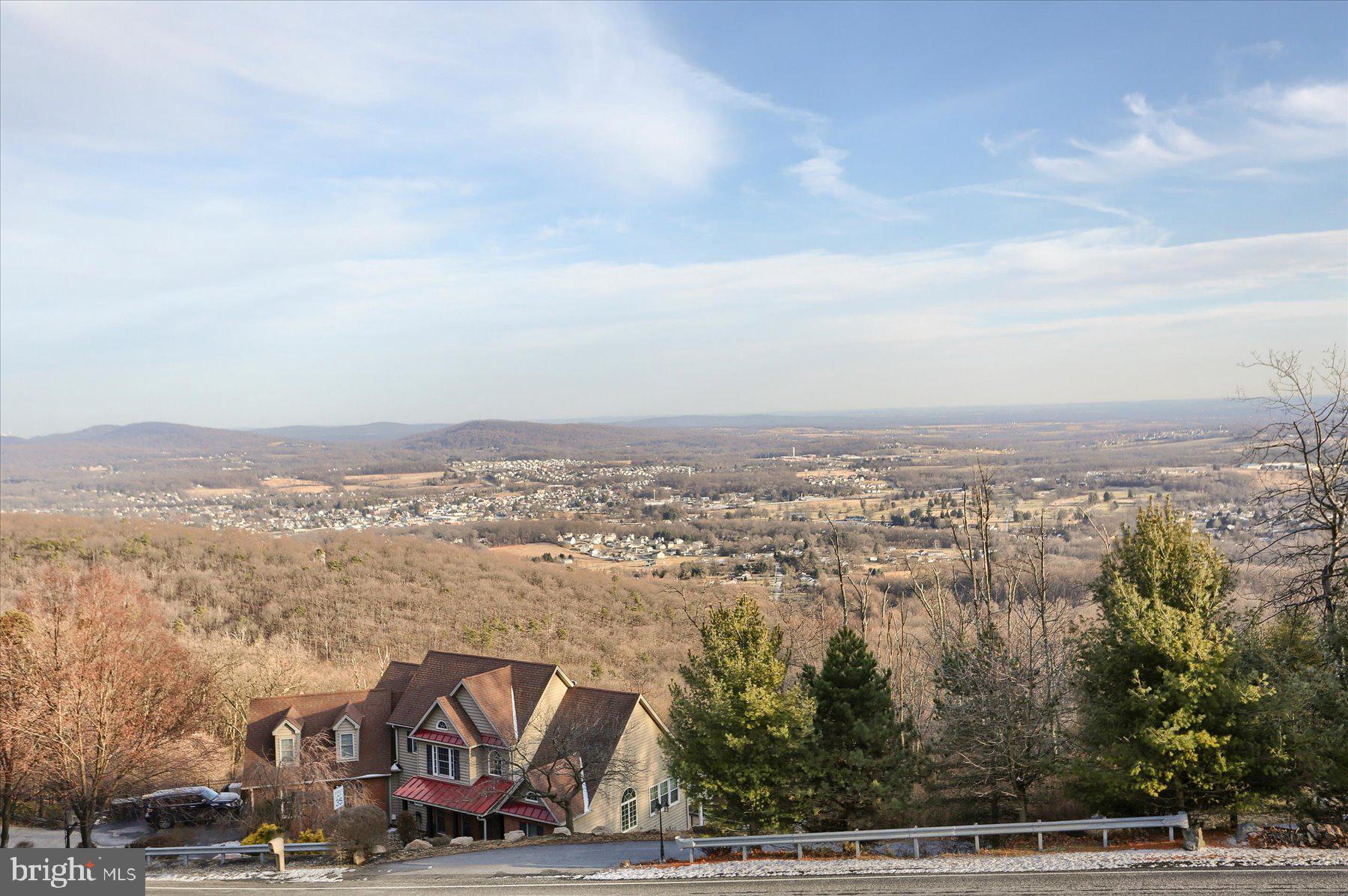 1065 Kuhn Road Boiling Springs, PA 17007 - Photo 7 of 49 an aerial view of residential building and trees