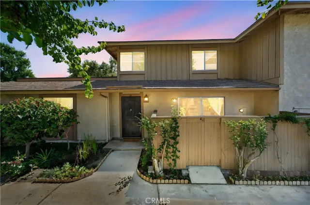 a front view of a house having yard