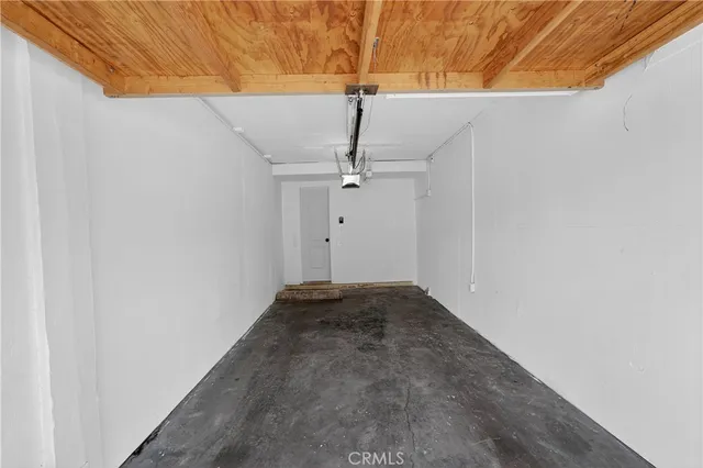 a view of empty room with ceiling fan