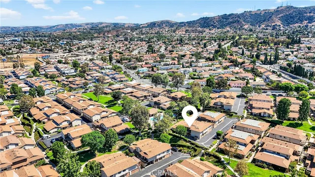 an aerial view of a city with lots of residential buildings