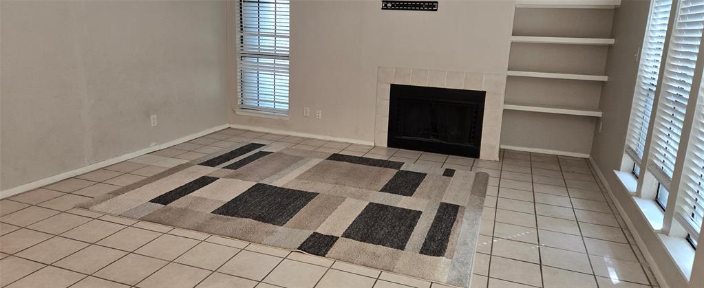 9601 Walnut Street, Unit 5104 Dallas, TX 75243 - Photo 1 of 20 a view of an empty room and window