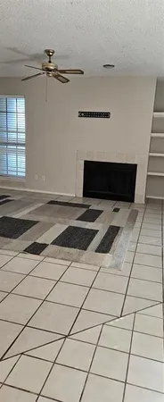 a view of a livingroom with wooden floor