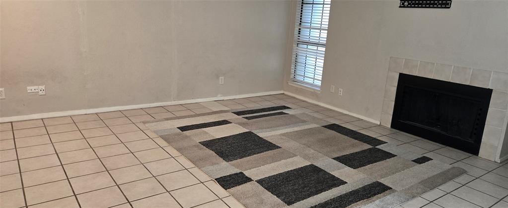 9601 Walnut Street, Unit 5104 Dallas, TX 75243 - Photo 3 of 20 a view of an empty room with windows