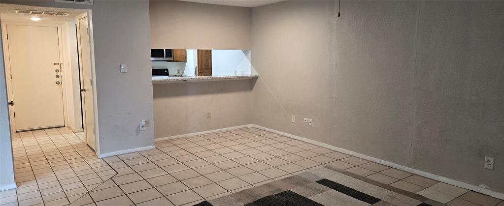 9601 Walnut Street, Unit 5104 Dallas, TX 75243 - Photo 4 of 20 a view of a hallway