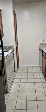 a view of kitchen with washer and dryer