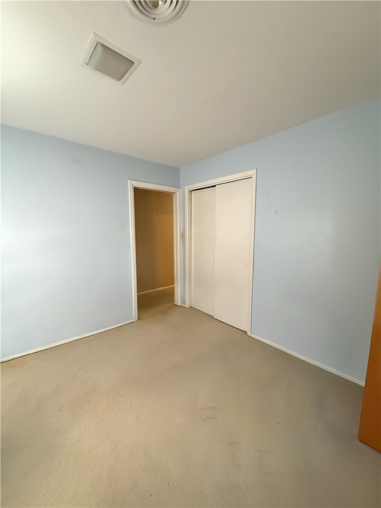 1118 Lincoln Street Alice, TX 78332 - Photo 18 of 32 an empty room with an entryway
