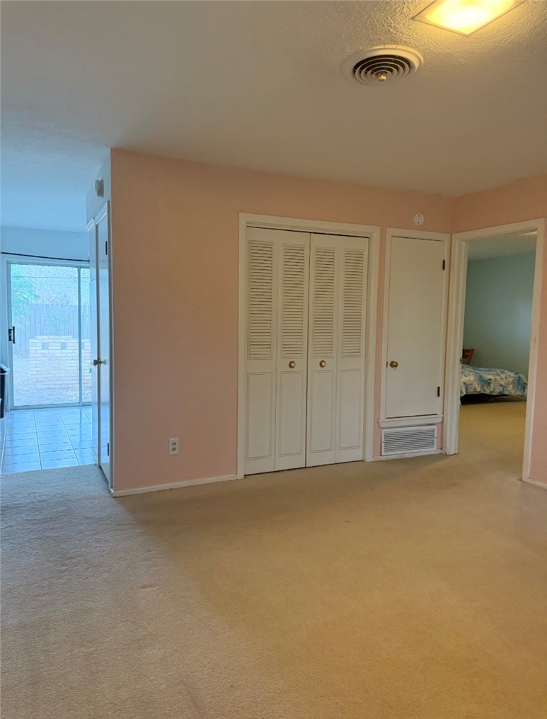 1118 Lincoln Street Alice, TX 78332 - Photo 19 of 32 an empty room with closet area