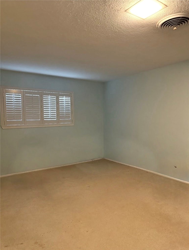 1118 Lincoln Street Alice, TX 78332 - Photo 23 of 32 an empty room with a window
