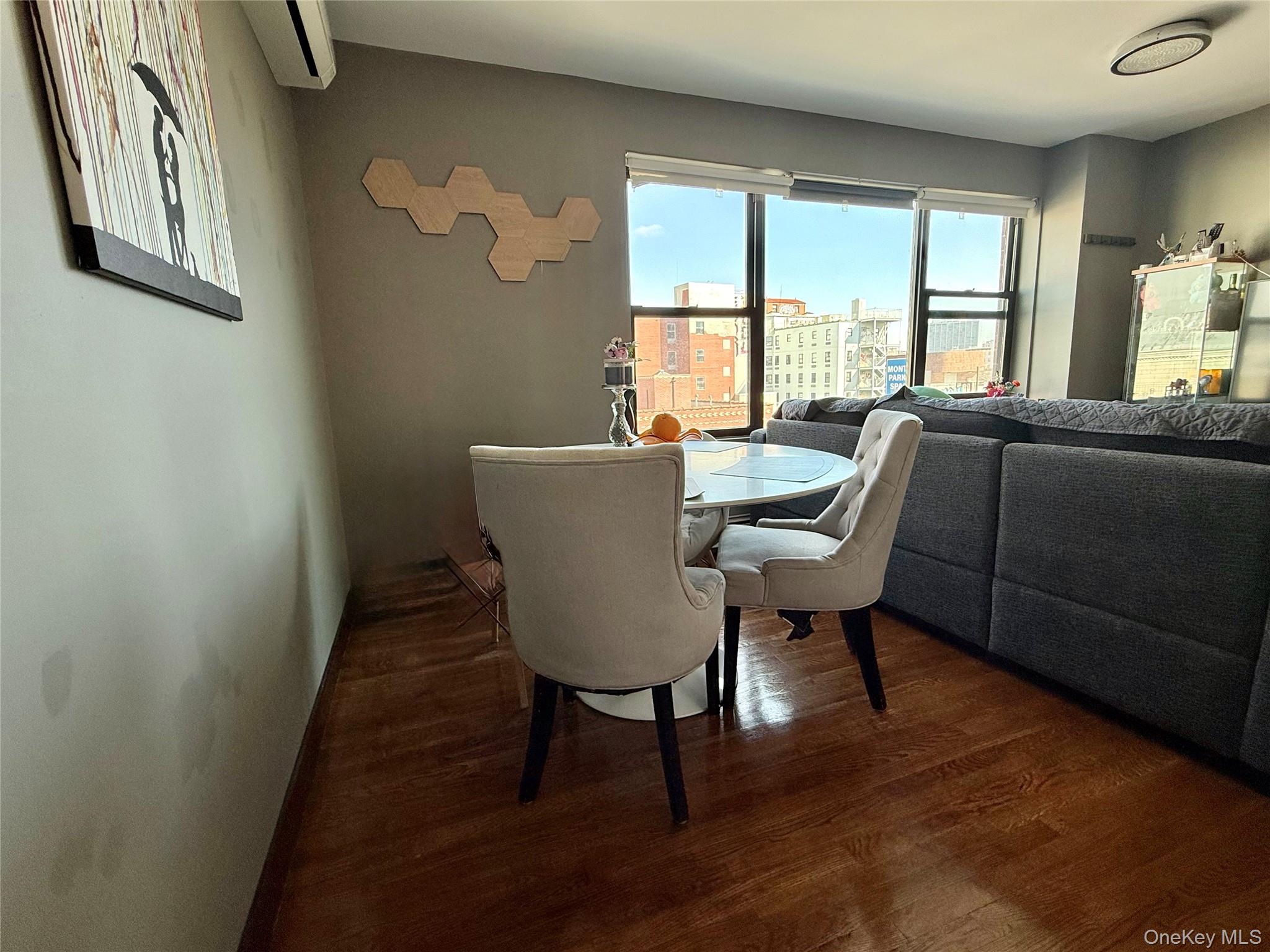 87-14 57th Road, Unit 5A Queens, NY 11373 - Photo 16 of 34 a view of a dining room with furniture window and outside view