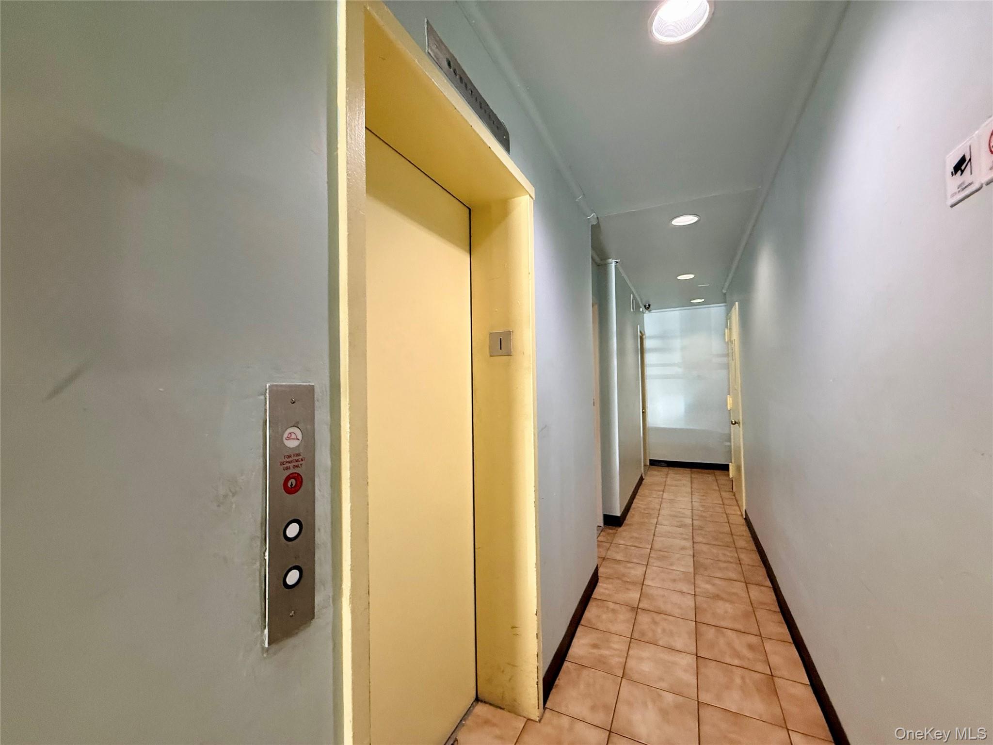 87-14 57th Road, Unit 5A Queens, NY 11373 - Photo 26 of 34 a view of hallway with wooden floor